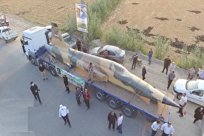 عکس | استقبال مردمی از حمل ماکت هواپیمای امیر سرلشگر خلبان شهید پرویز ذبیحی در جویبار