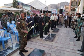 عکس | غبارروبی گلزار شهدای کرمان