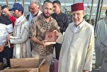 Mga Quran na Ibinahagi sa Pagitan ng mga Pasahero na Dumarating sa Paliparan ng Al-Aaroui ng Morokko